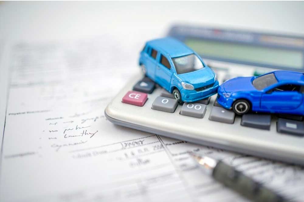 What type of expenses can occur from owning a used vehicle